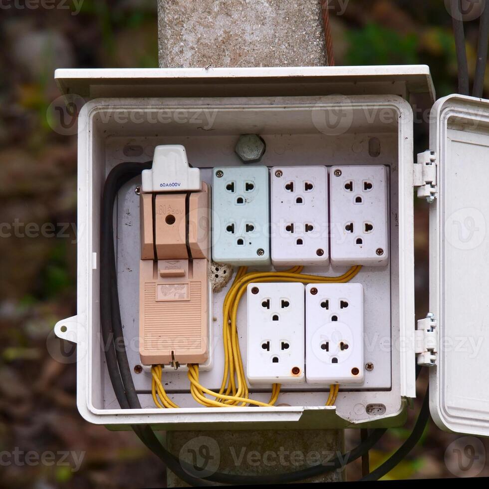 Electrical Power Distribution Box with Multiple Outlets and Cables on White Background Isolated photo