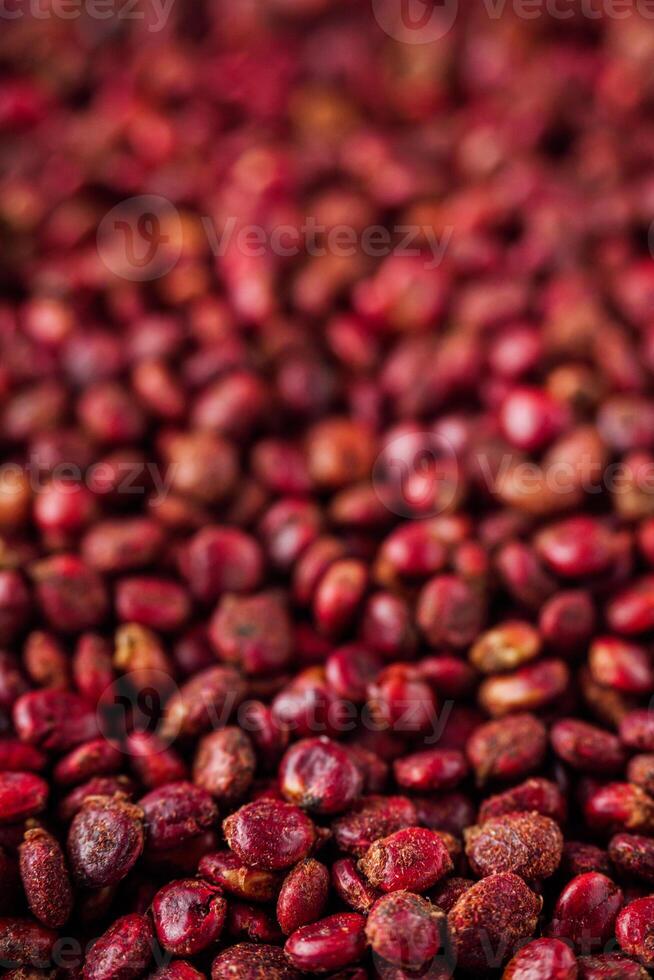 dry aromatic sumac spice on a white background photo