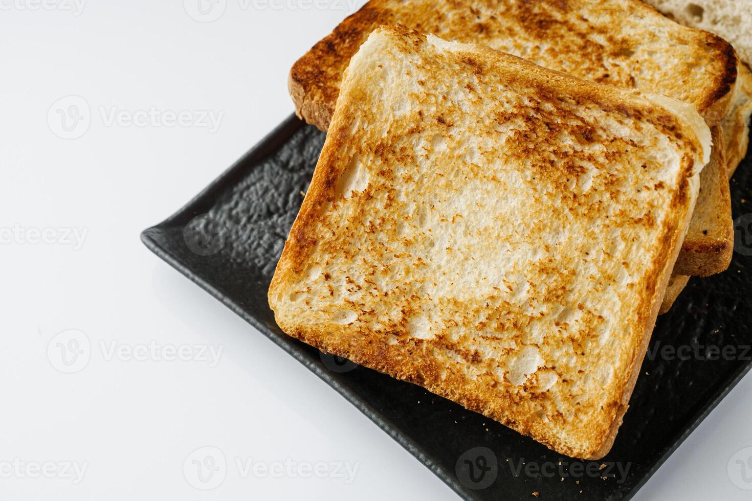 fresh toasted bread on a white background photo