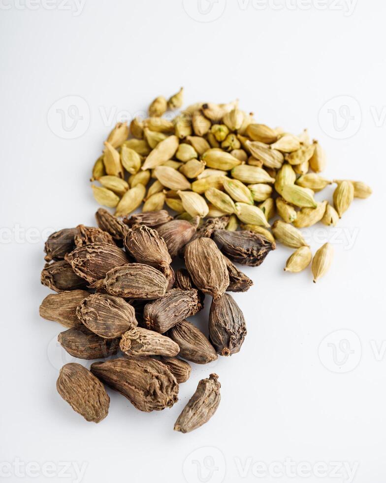 barrel dried black cardamom on a white background photo