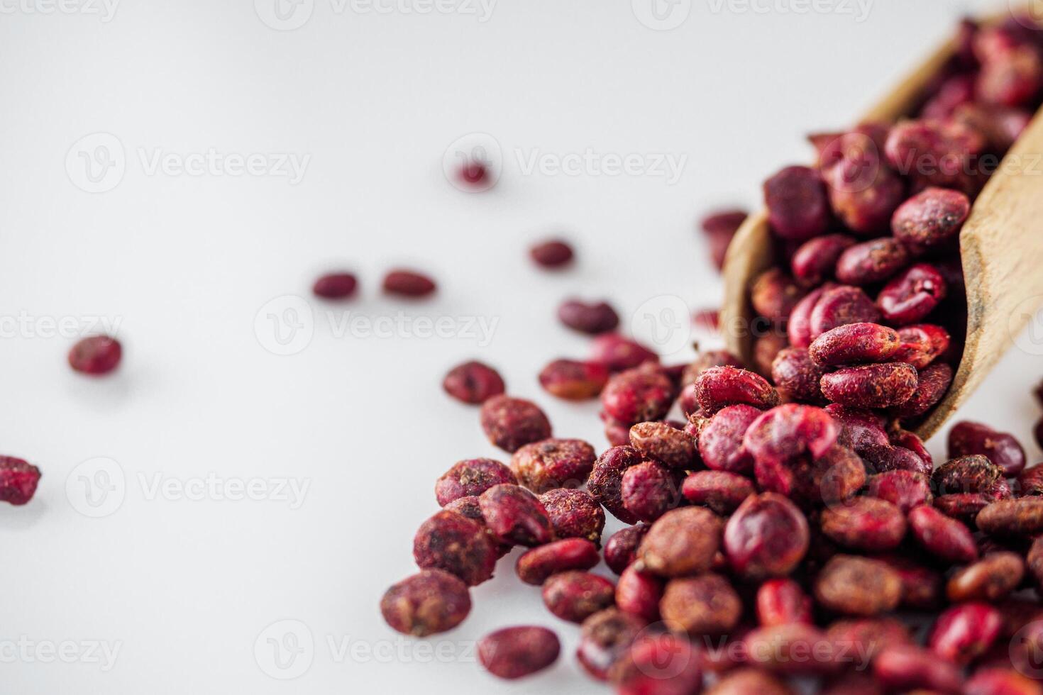 dry aromatic sumac spice on a white background photo