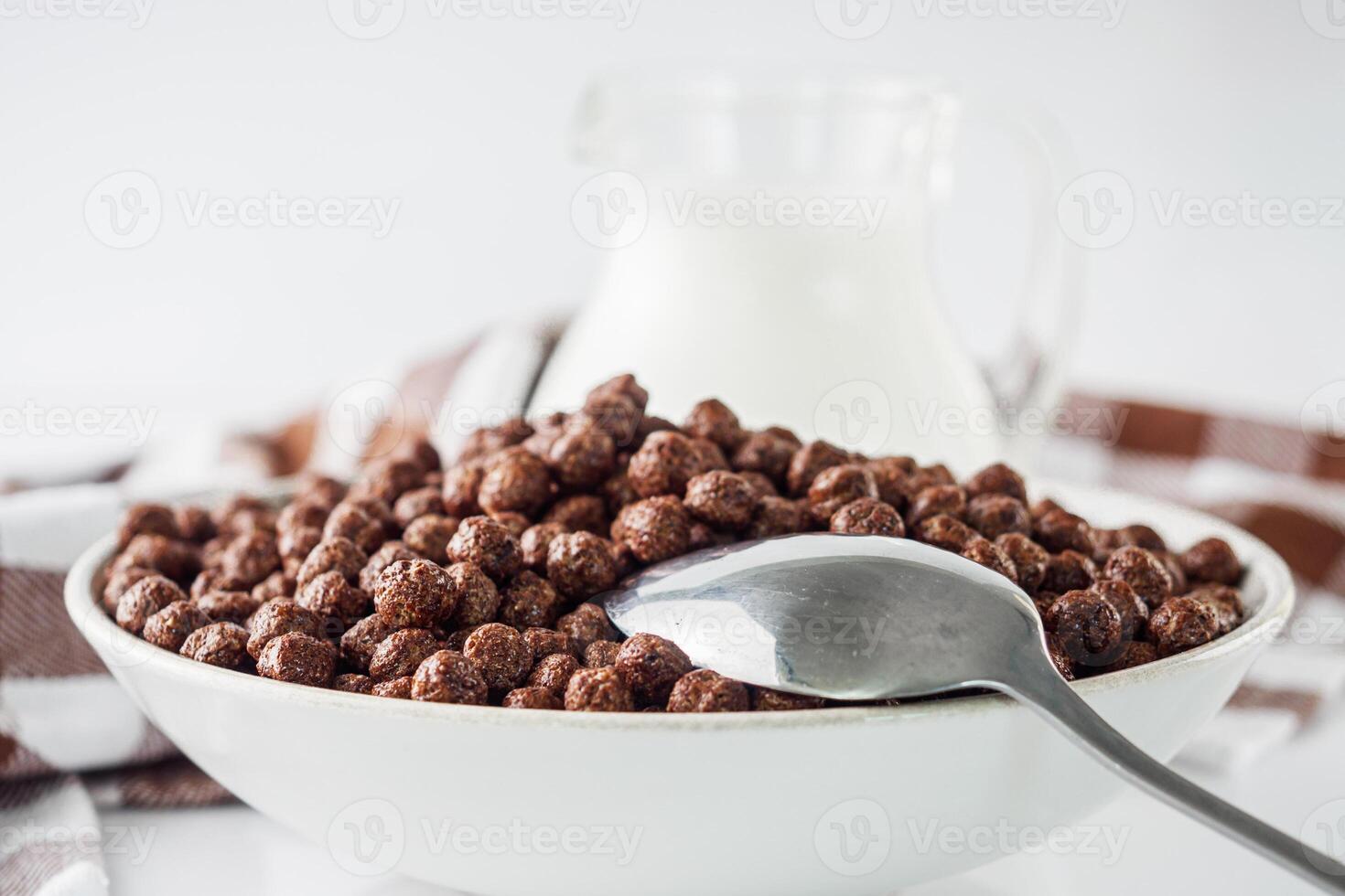 sweet crunchy chocolate children's breakfast chocolate balls on a white background photo