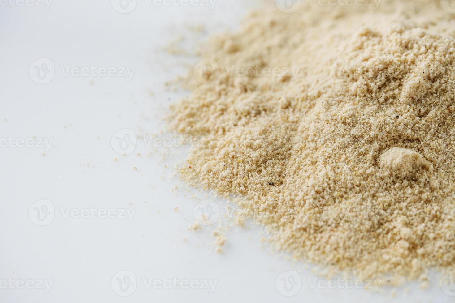 asafoetida aromatic powder on a white acrylic background photo