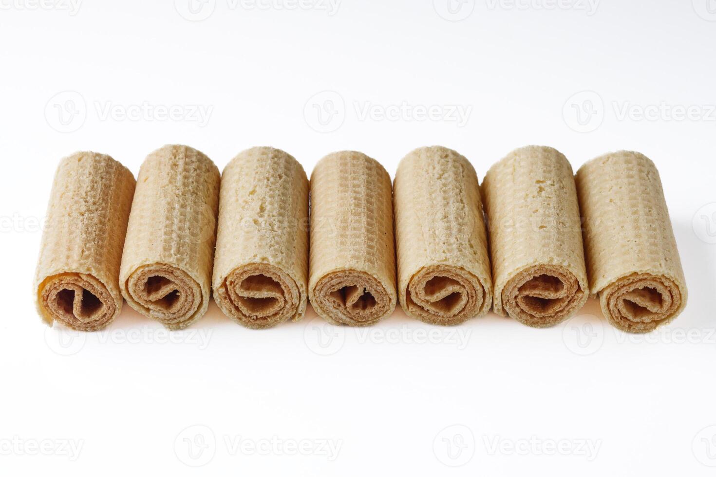crispy dessert wafer rolls on a white background photo