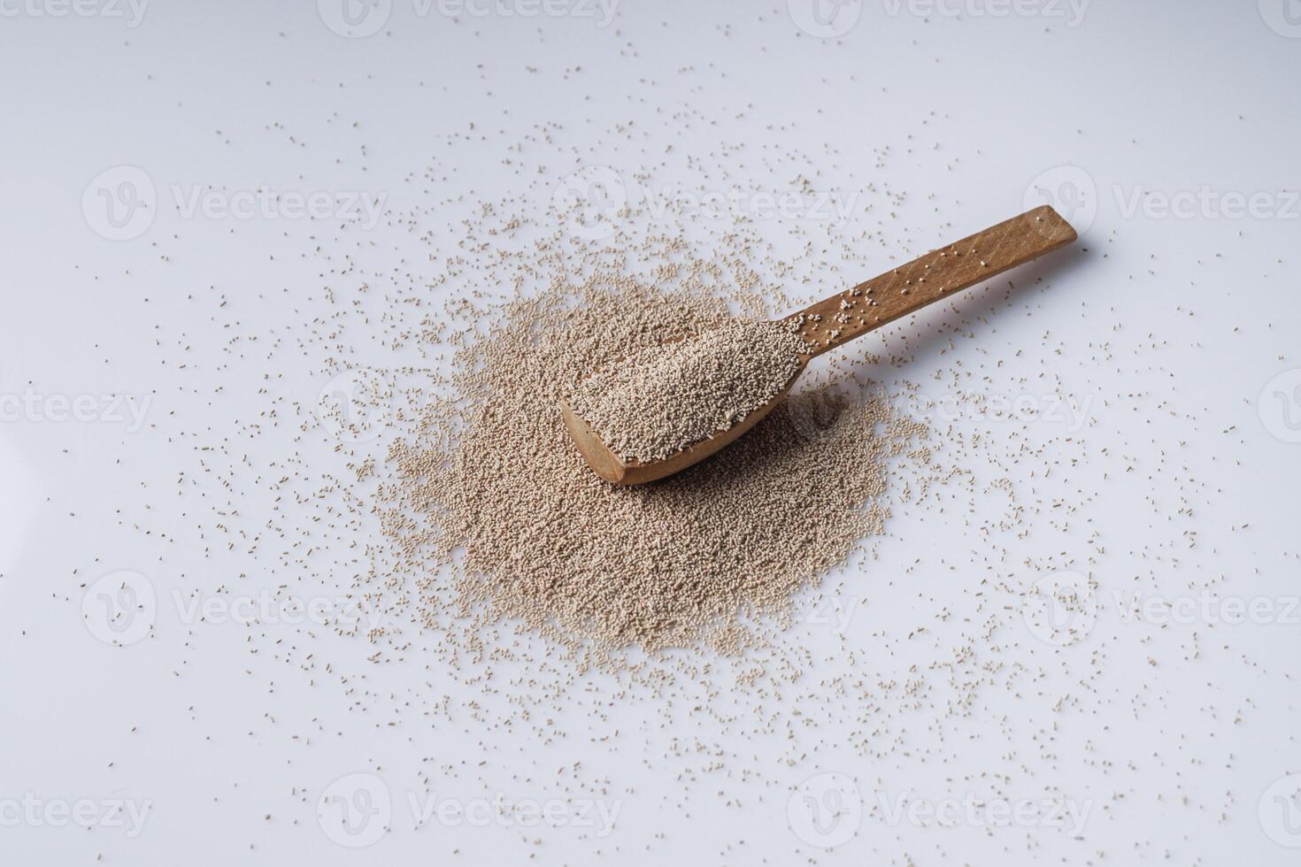 Granulated dry yeast on a white background photo