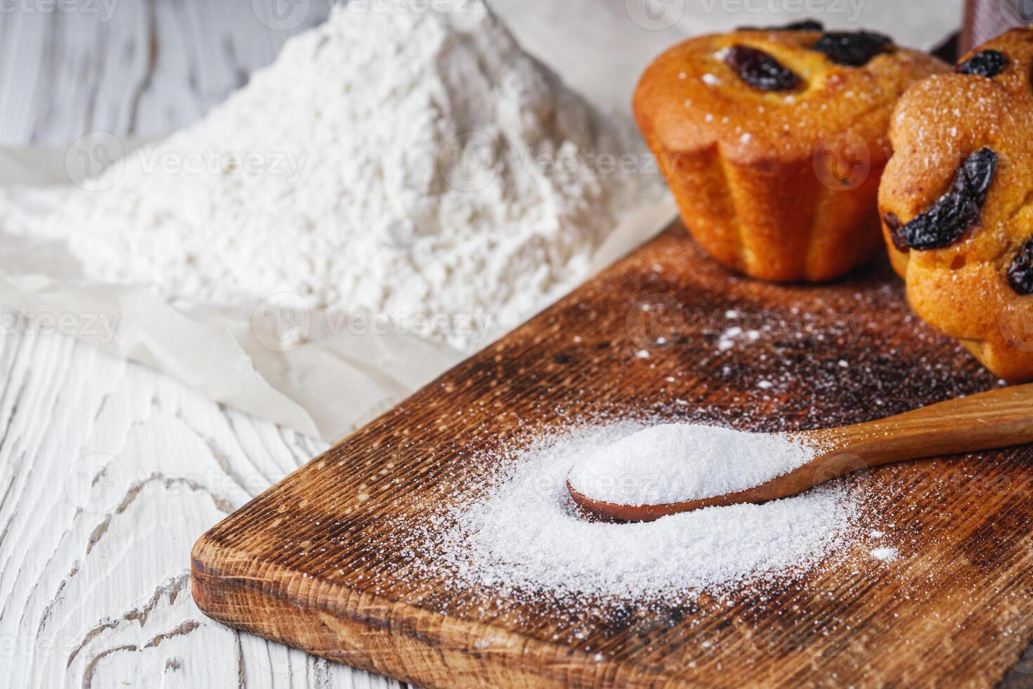 muffins baked with the addition of ammonium carbonate on a wooden rustic background photo