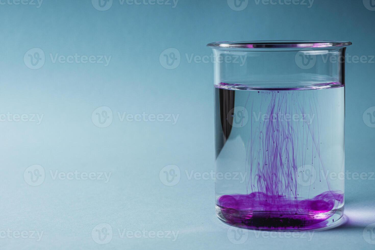 potassium permanganate solution on a blue background photo