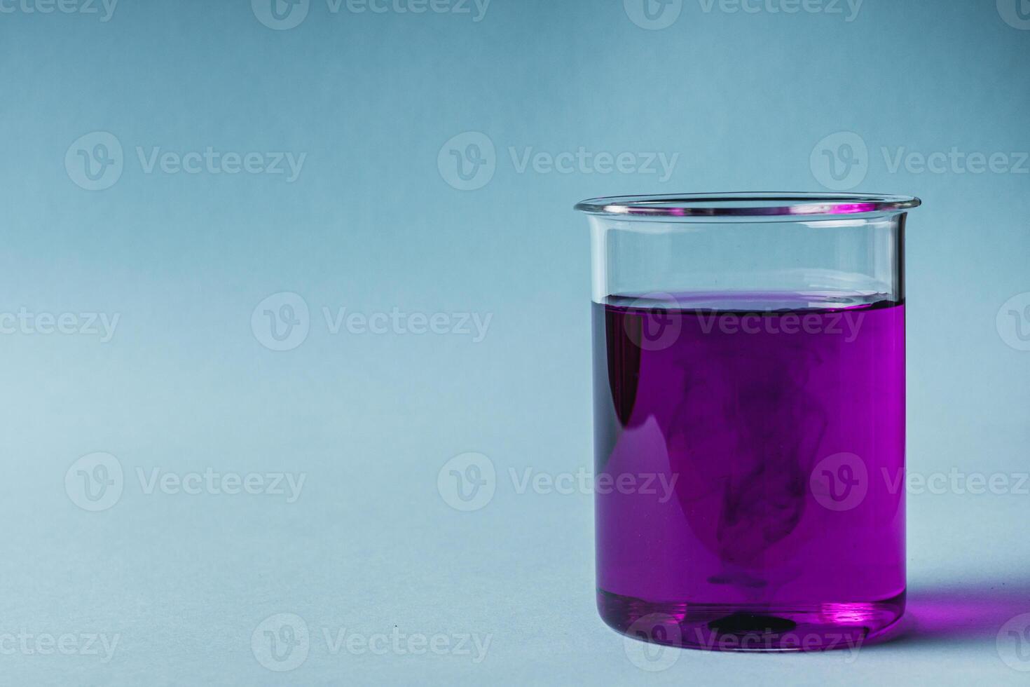 potassium permanganate solution on a blue background photo