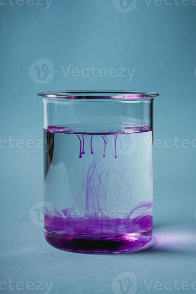 potassium permanganate solution on a blue background photo