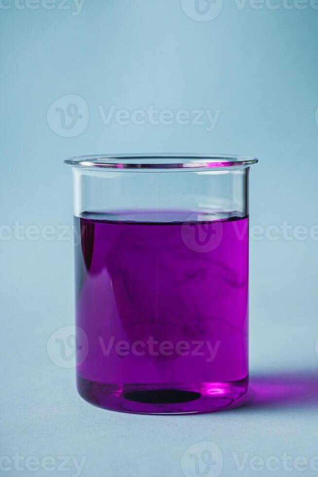 potassium permanganate solution on a blue background photo