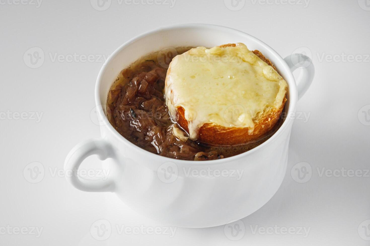 delicious original French onion soup on a white background photo