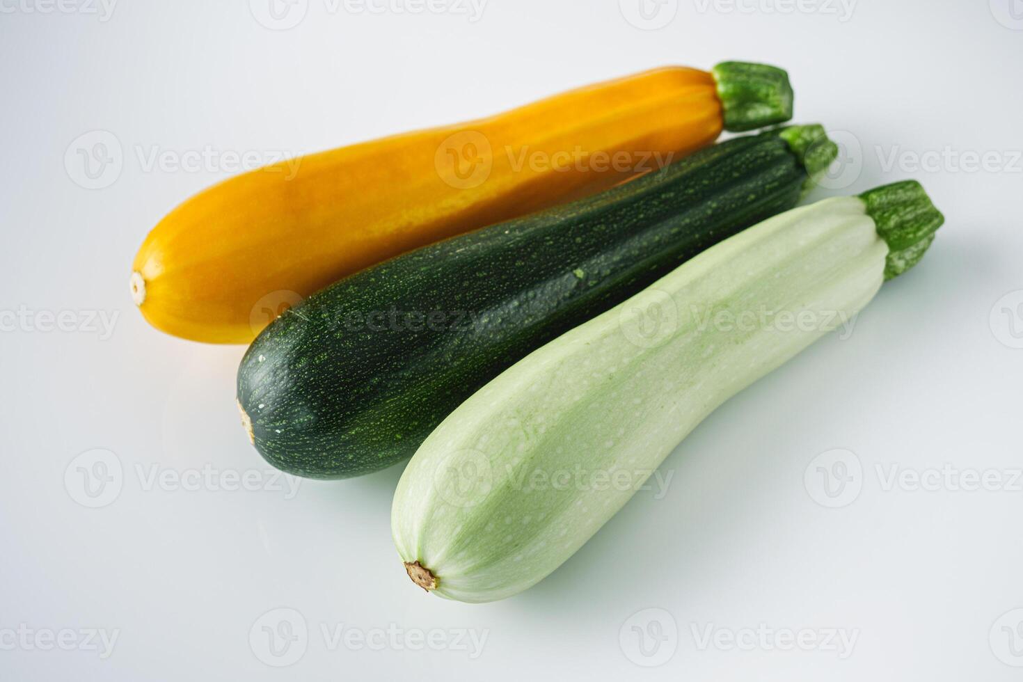 fresh natural zucchini on a white background photo