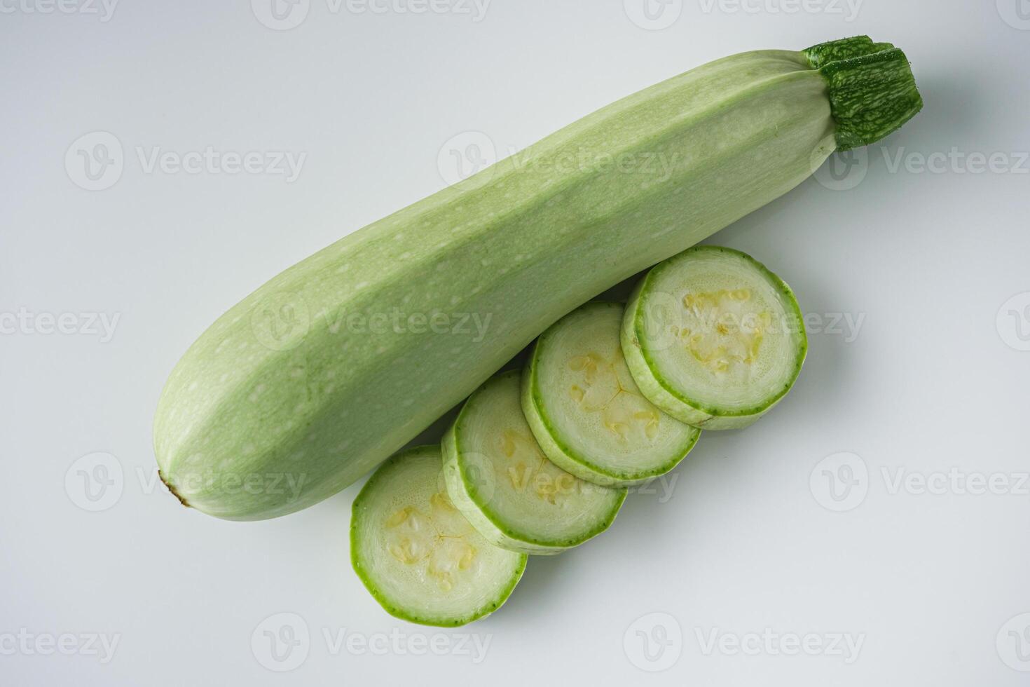 fresh natural zucchini on a white background photo
