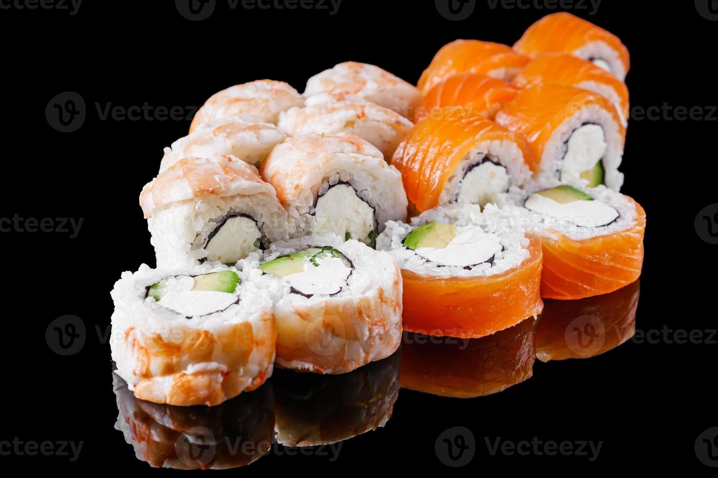 sushi roll with shrimp Ebby cream cheese Philadelphia avocado cucumber on a black mirror background photo