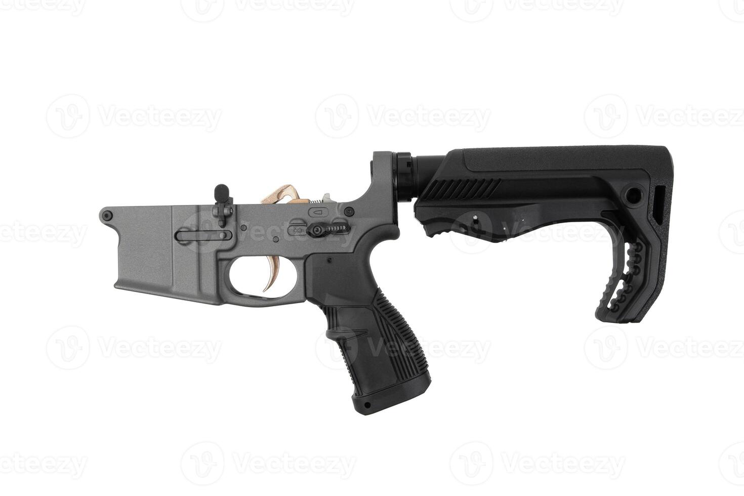 Lower receiver and buffer spring. Bottom half of a modern assault rifle. Isolate on white back photo