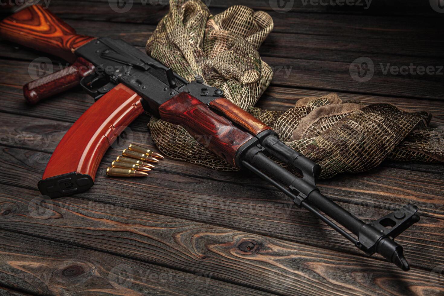 Classic Soviet AK machine gun on a wooden back. Weapons of Russia and the Soviet Union. photo