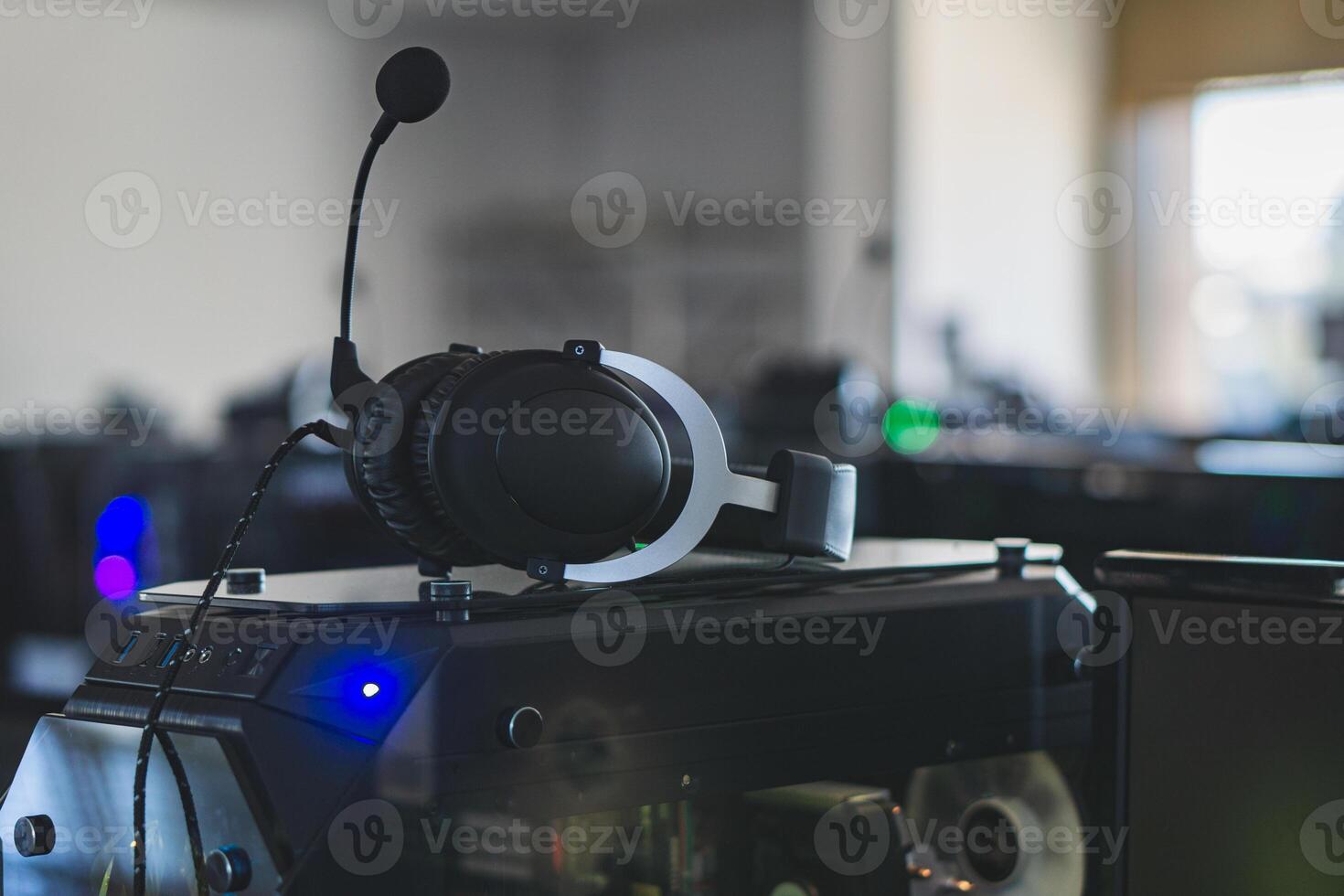 Computer stereo headset with microphone is on the PC photo