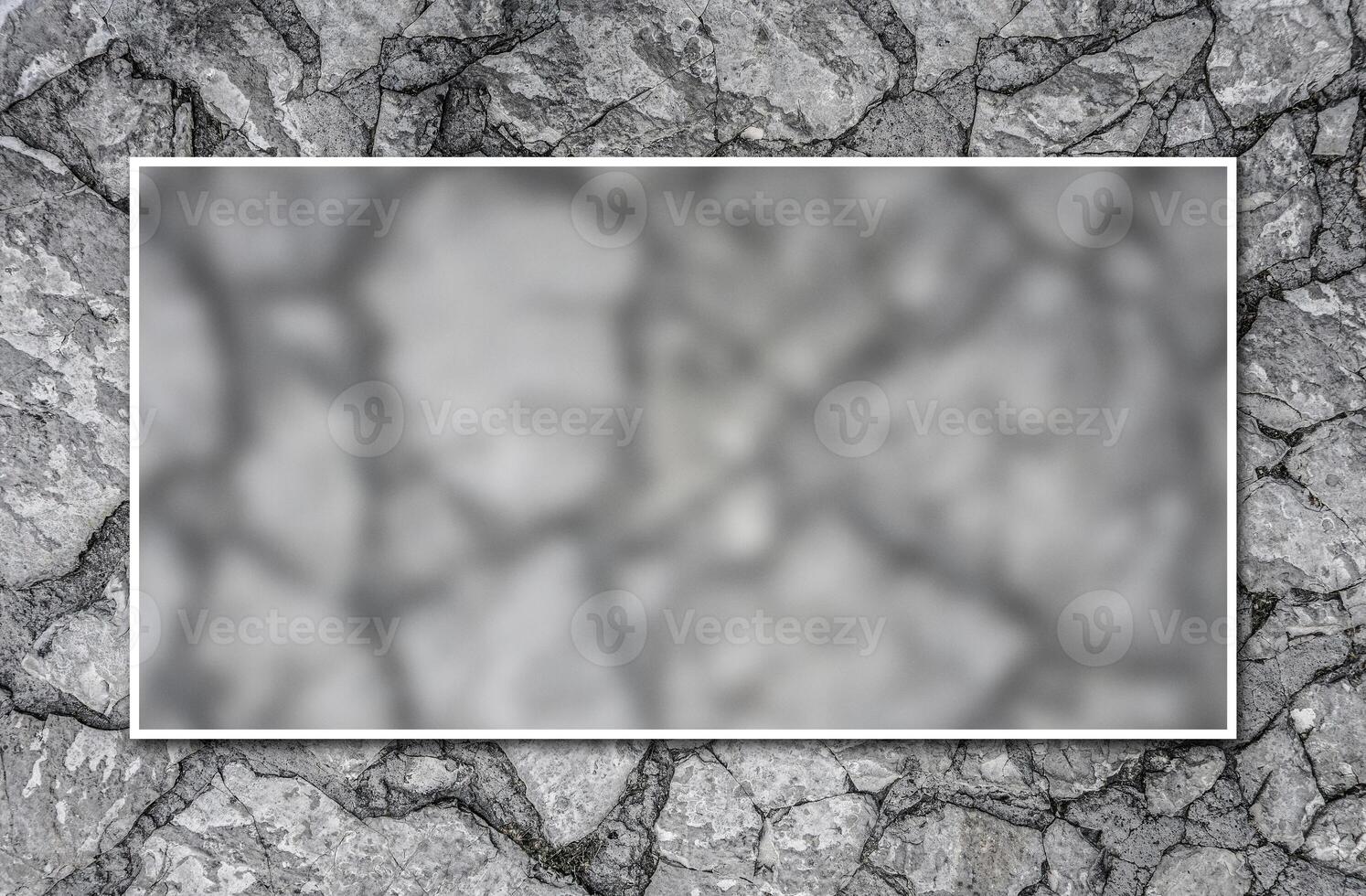 White passepartout frame around blurry background. Stone floor texture. Harmonic pattern of slate tiles at the floor. photo