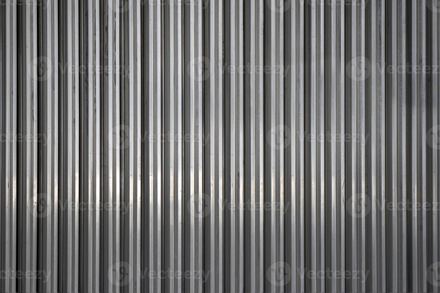 Background from unpainted corrugated metal. Vertical stripes. photo