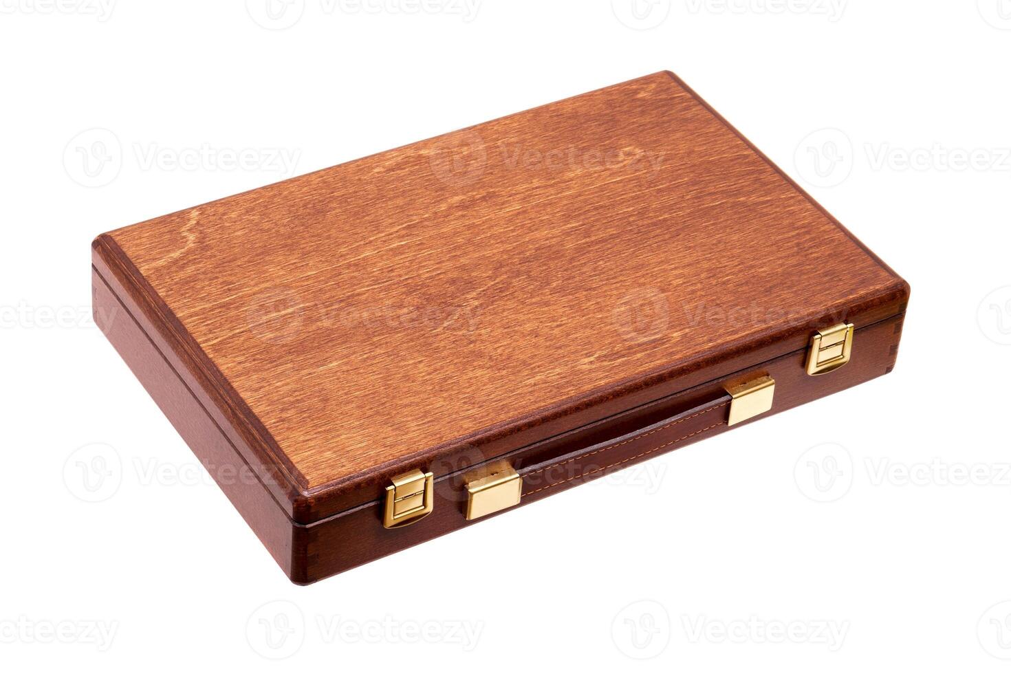 wooden brown box with a handle and gold locks isolated on white photo