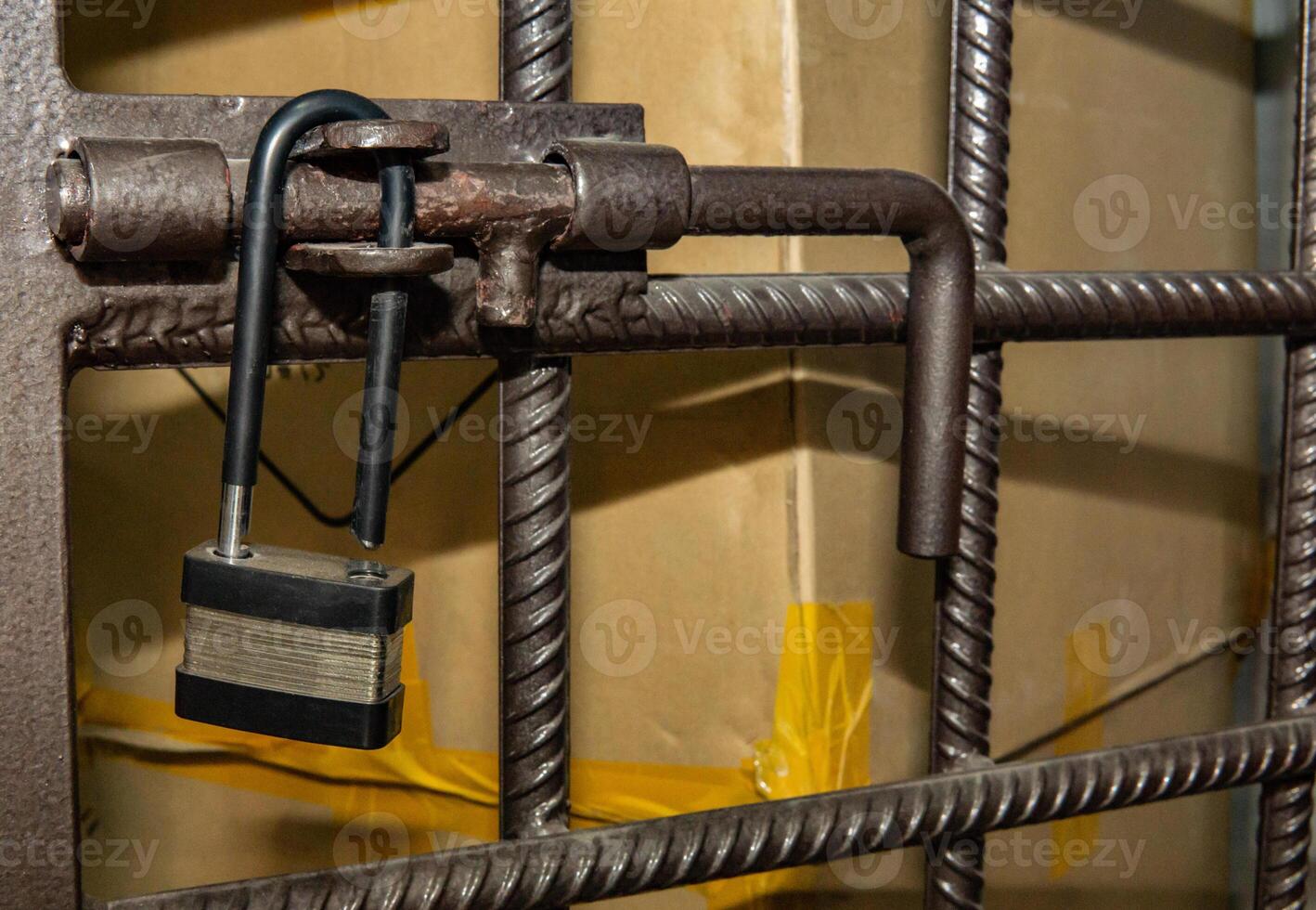 open padlock on the cage photo