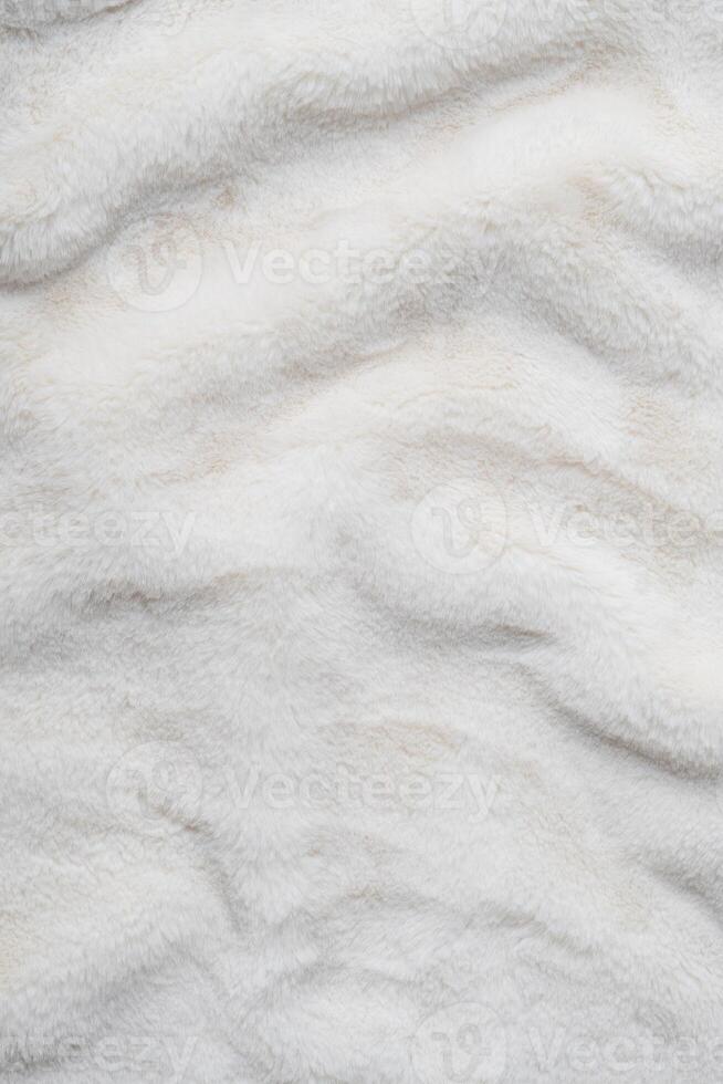 Texture of faux fur. Empty place for text, quote or sayings. Top view. Closeup. Light fur back. photo