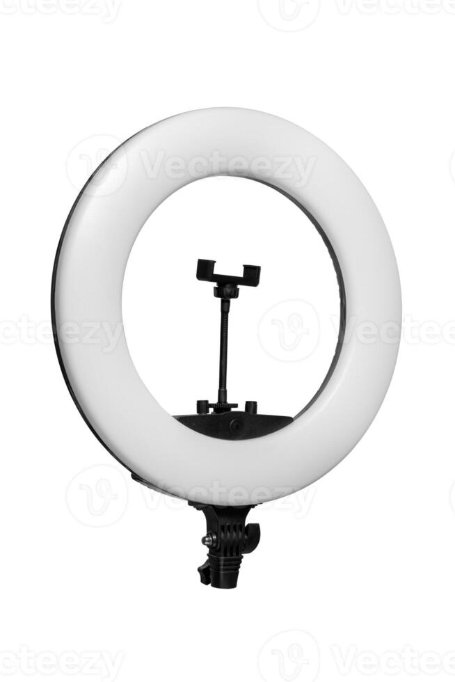 Closeup of circular neon LED lamp isolated white background. Pop photo