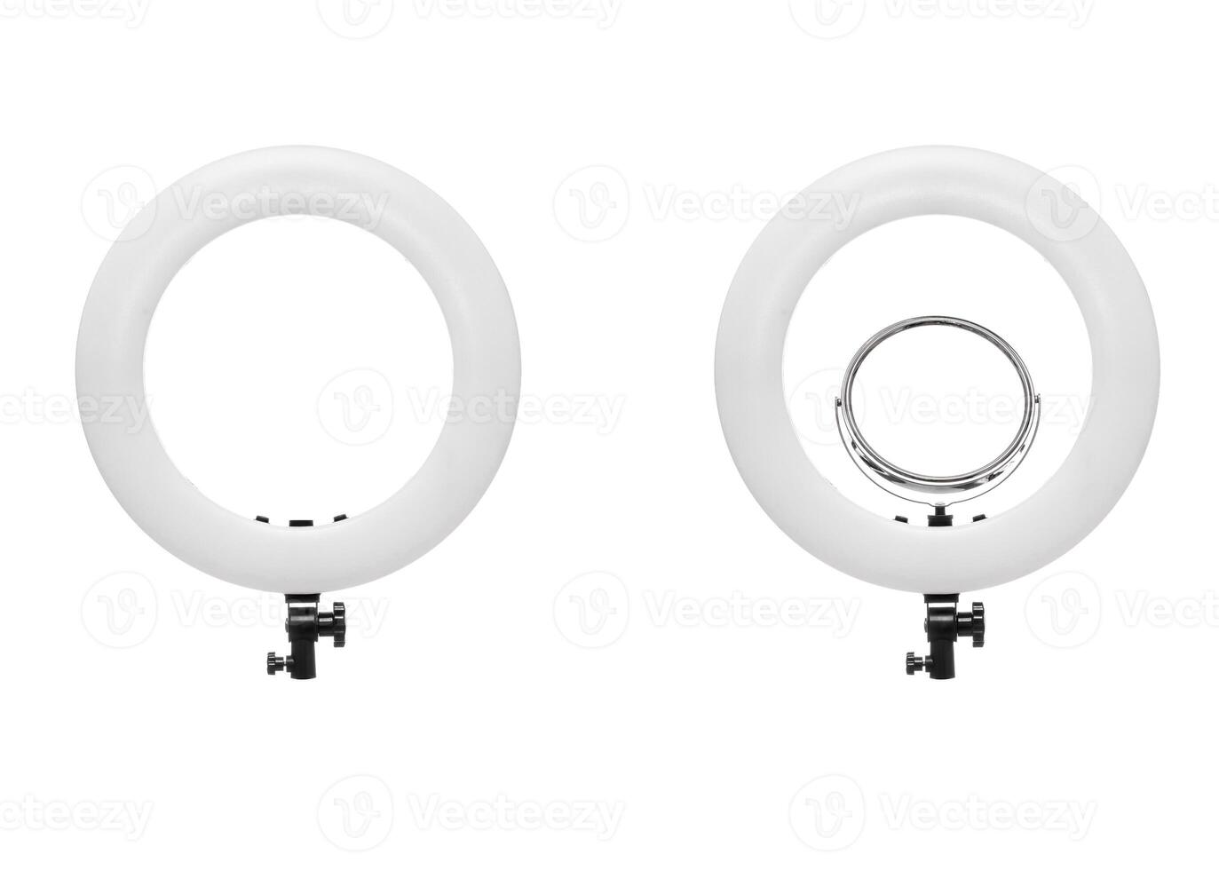 Closeup of circular neon LED lamp isolated white background. Popular modern light for make-up and beauty portraits. photo
