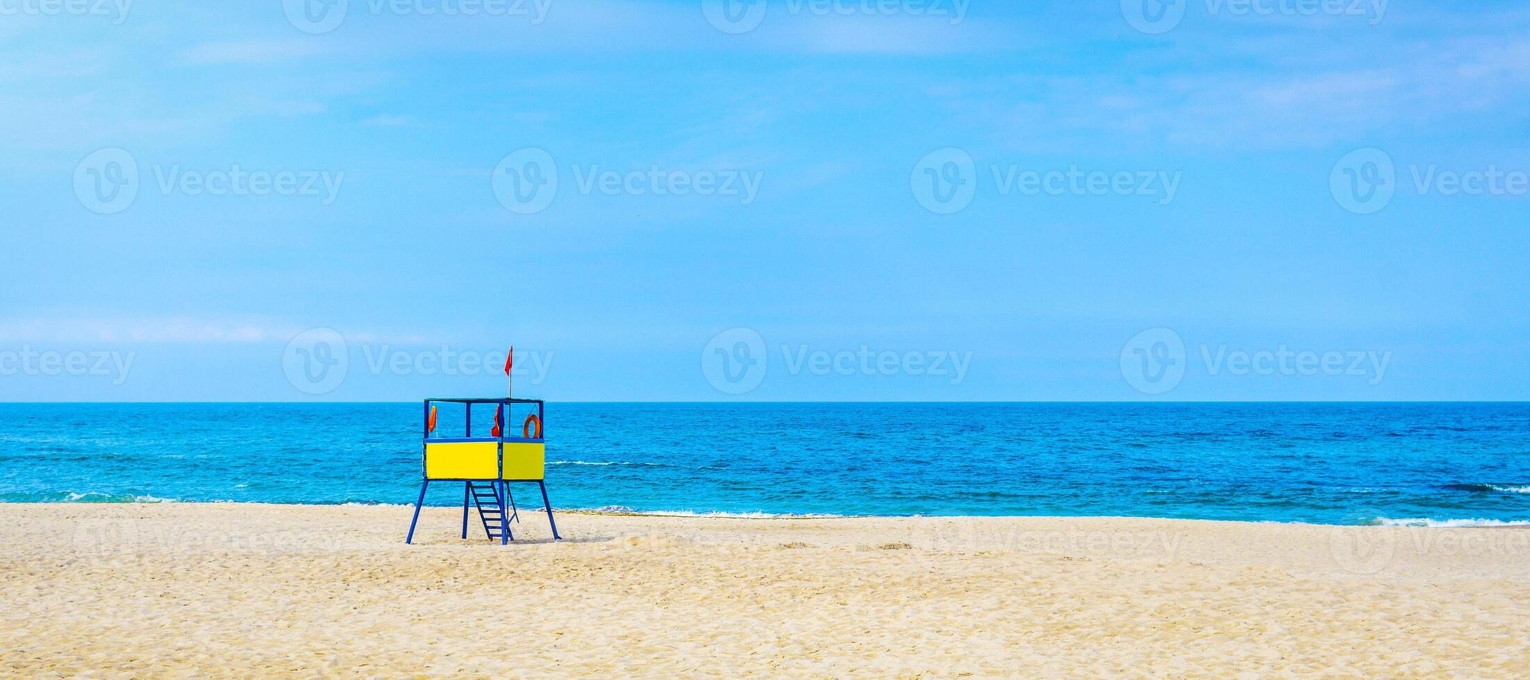 lifeguard tower at the beach. background for summer postcard from vacation photo