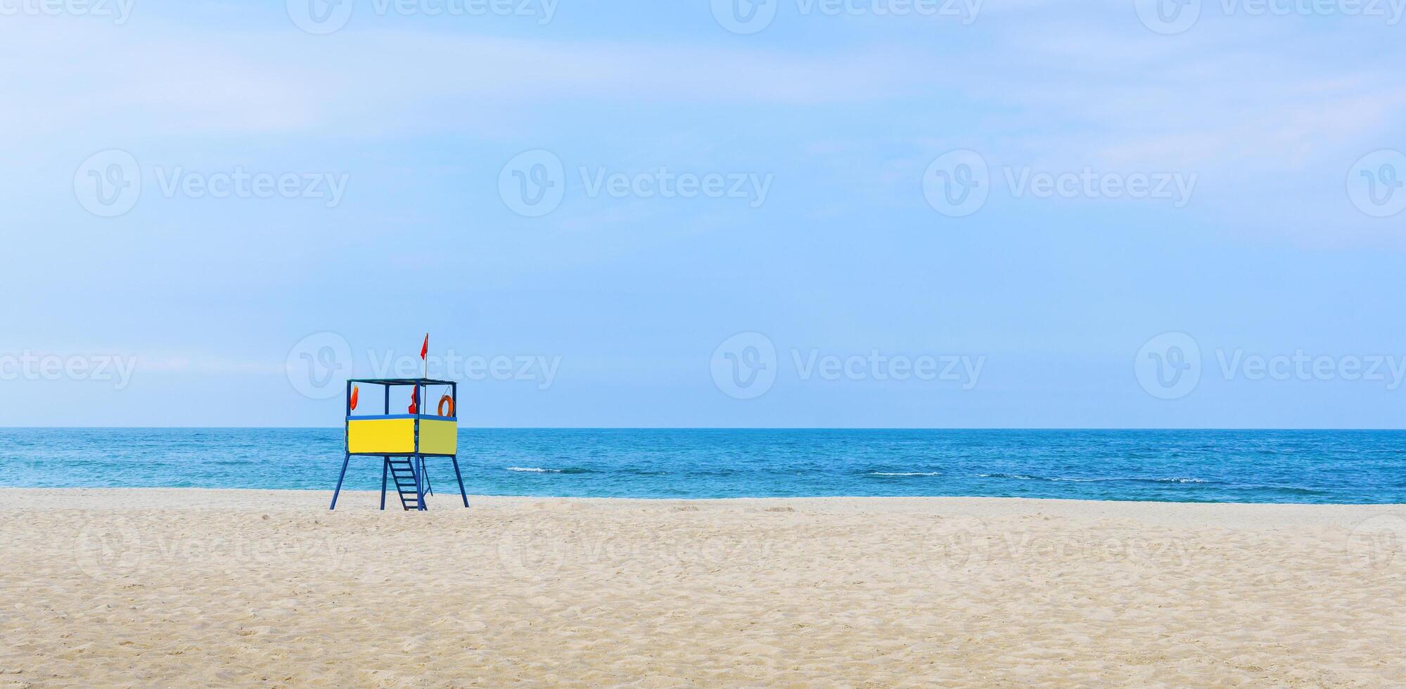 lifeguard tower at the beach. background for summer postcard from vacation photo