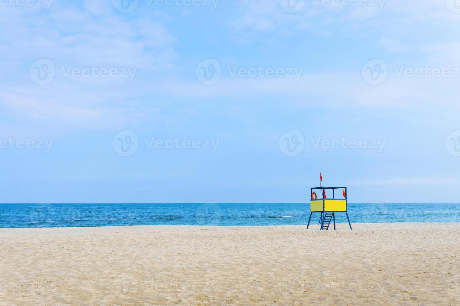 lifeguard tower at the beach. background for summer postcard from vacation photo