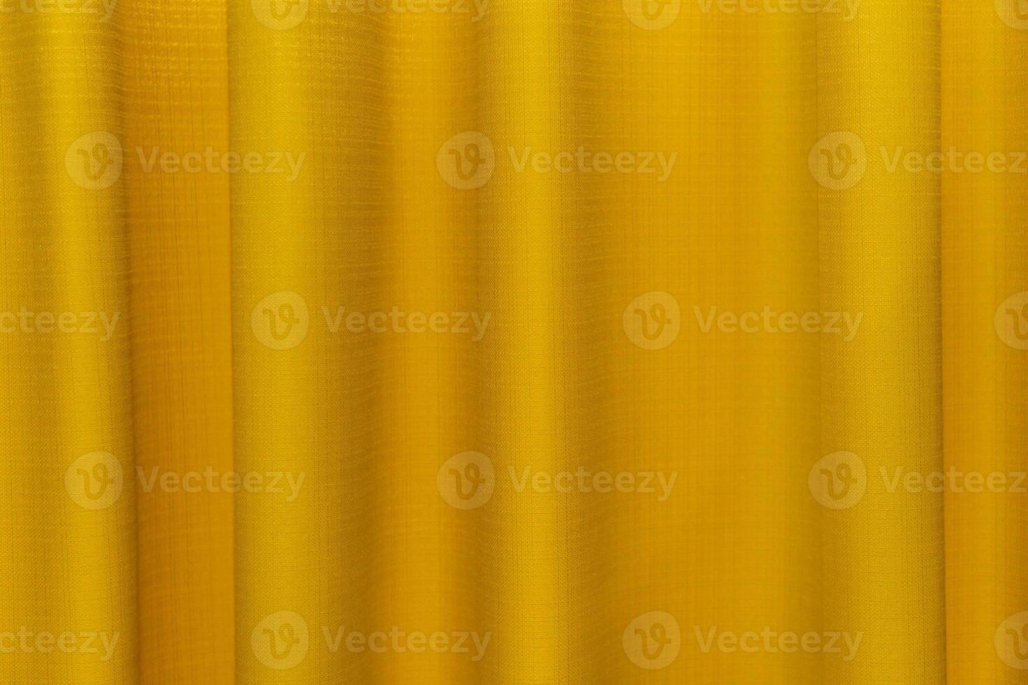 Fabric yellow curtains. Abstract background, curtain, drapes gold fabric. Crumpled cloth, folds of fabric. photo