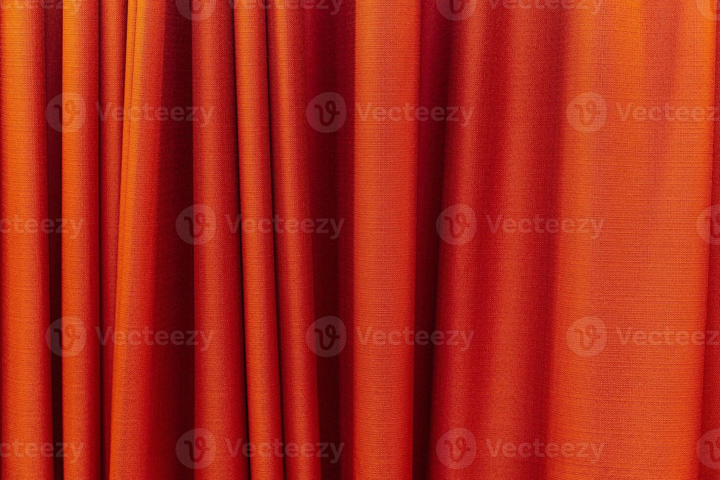 Fabric red curtains. Abstract background, curtain, drapes red fabric. Crumpled cloth, folds of fabric. photo