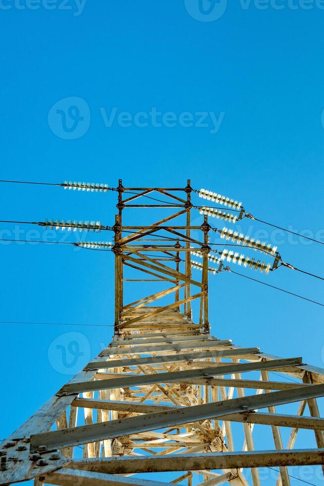 tower power lines against the sky photo