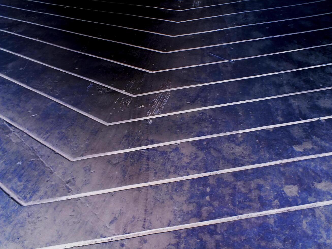 abstract background pattern texture of light reflections on the floor cement photo
