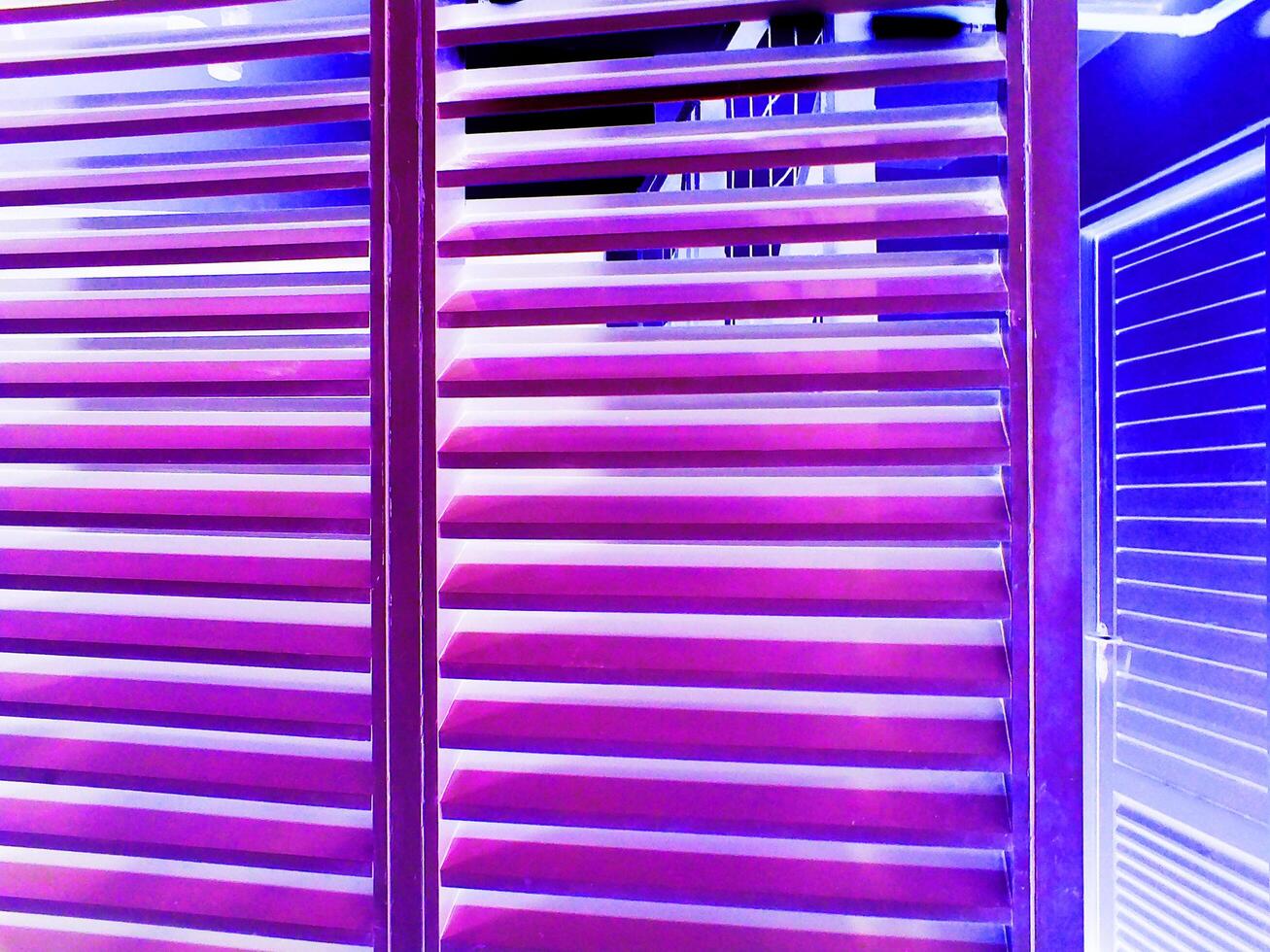 abstract background neon purple light striped window. futuristic design wallpaper, copy space for text photo