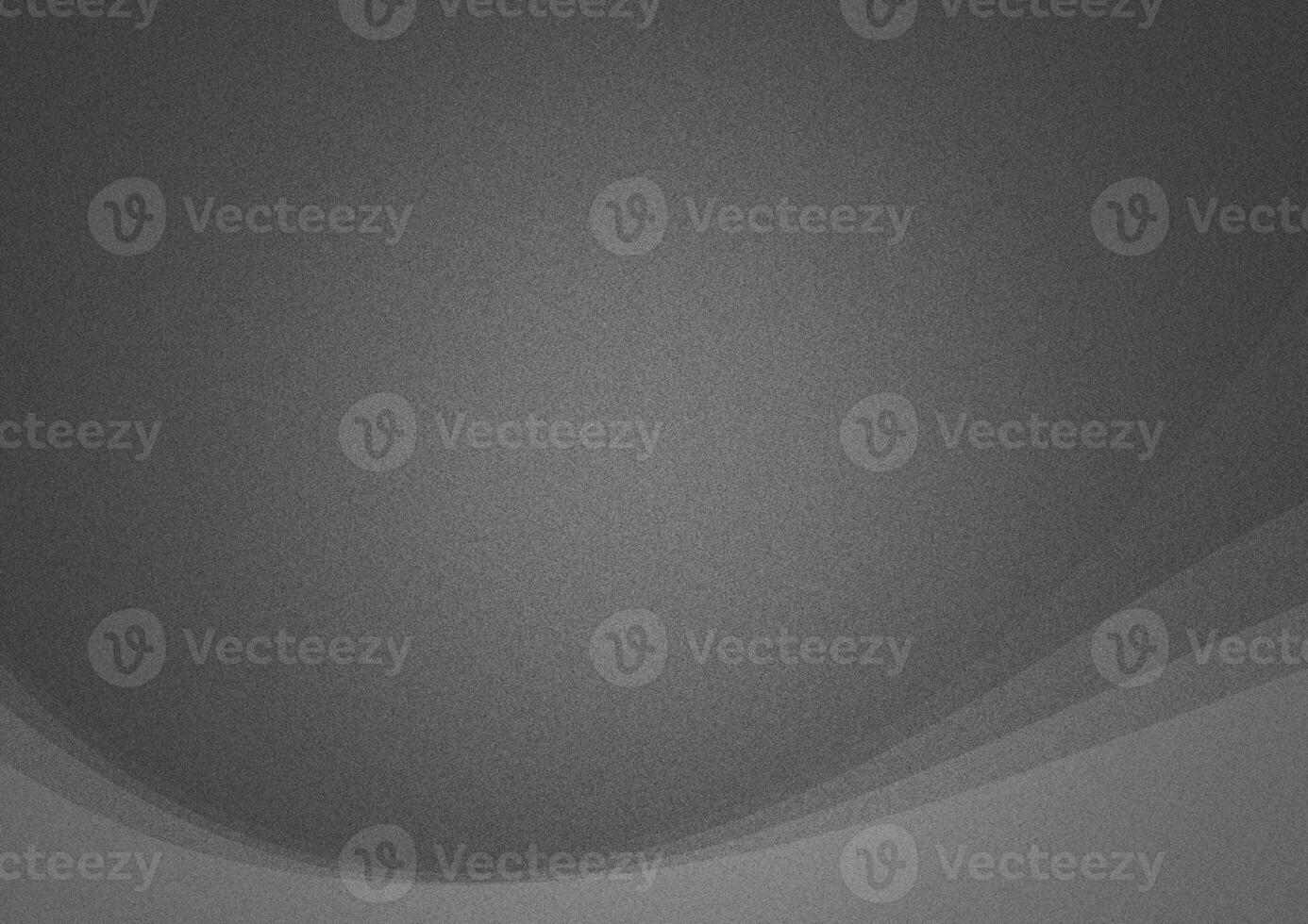 grainy gray background with a bright spot and light waves on the edges photo