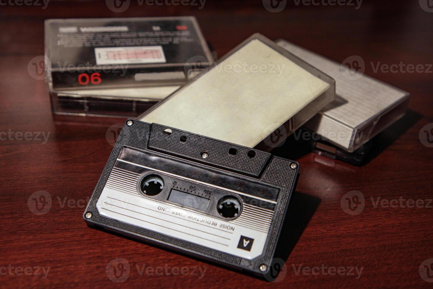 Close-up of an audio cassette with a sticker without text. Analog storage medium. Cassettes for audio recordings and music. photo