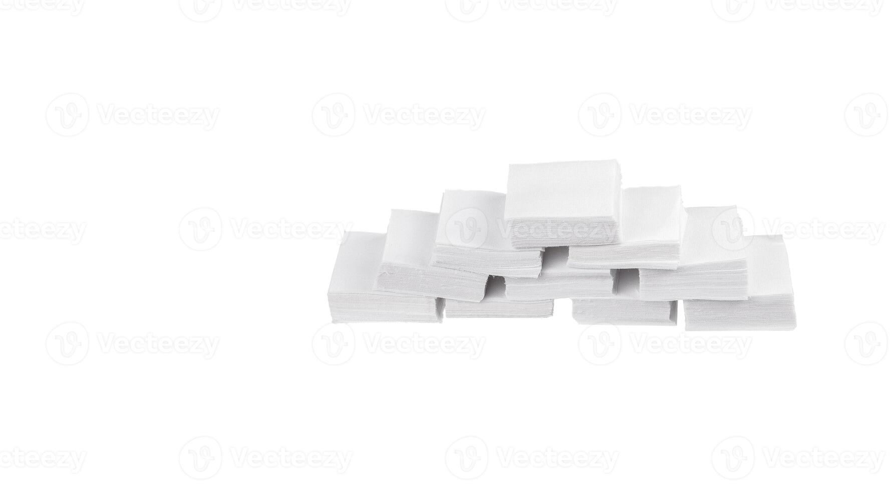 Patches for cleaning weapons isolate on a white background. White square scraps of fabric stacked in piles. photo