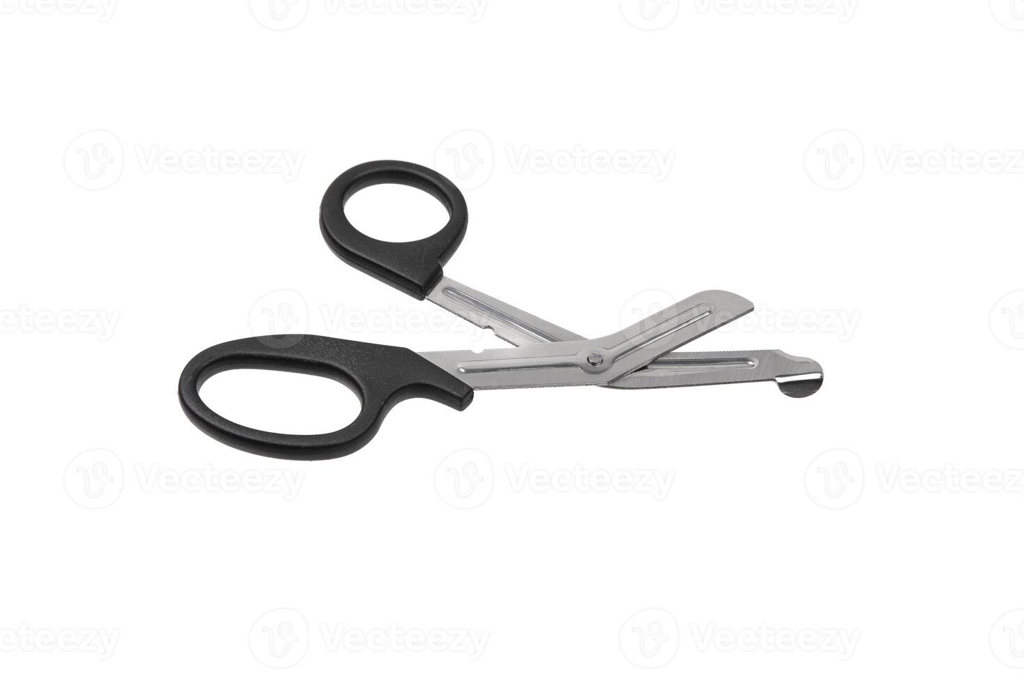 Medical metal scissors with black plastic handles. Paramedic tool. Isolate on a white back. photo