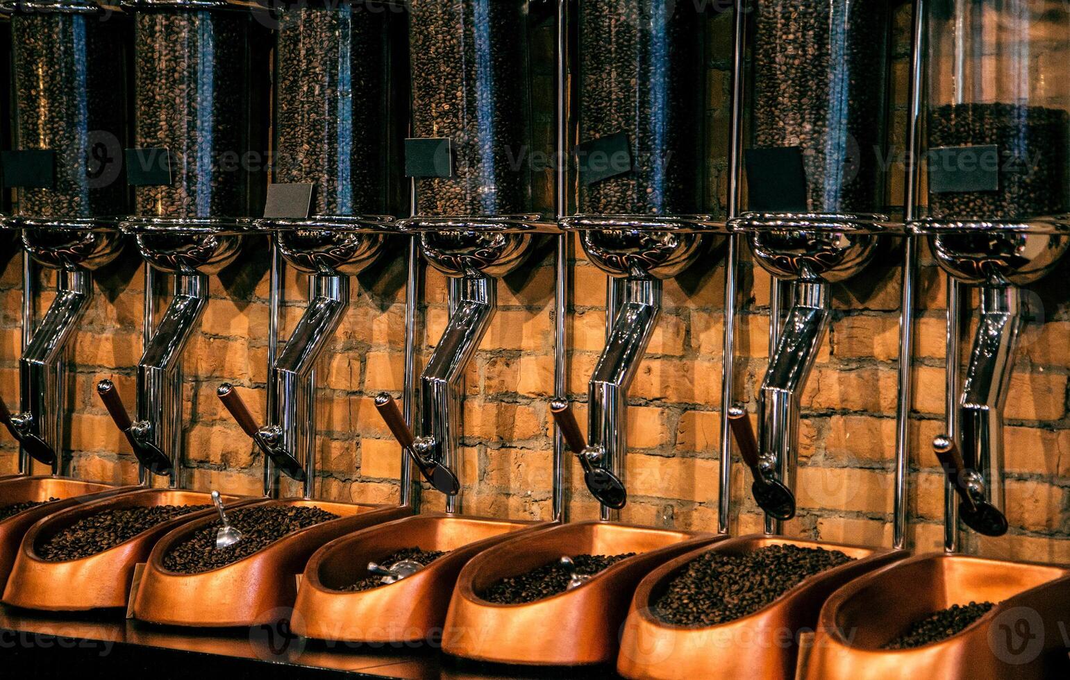 Different types of coffee in special dosing devices. Coffee for sale. photo
