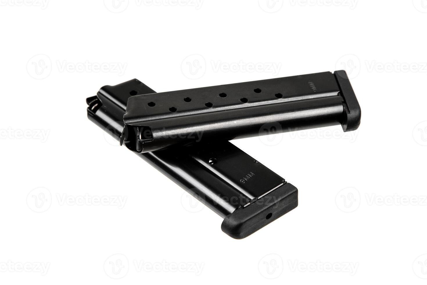Metal pistol magazine for 9 mm cartridges. Clip for ammunition. Isolate on a white back. photo