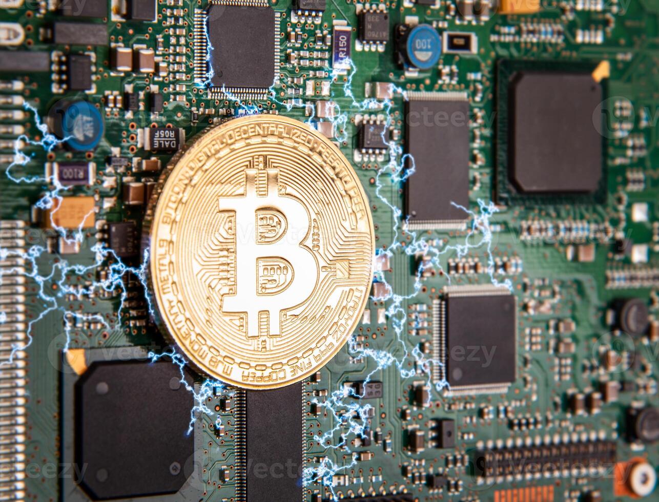 gold coin bitcoin on a green board with microchips photo