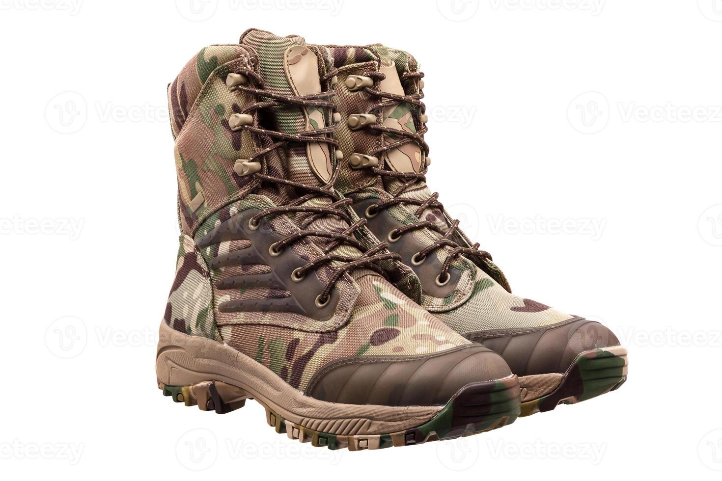 Camouflage military boots isolated on white photo