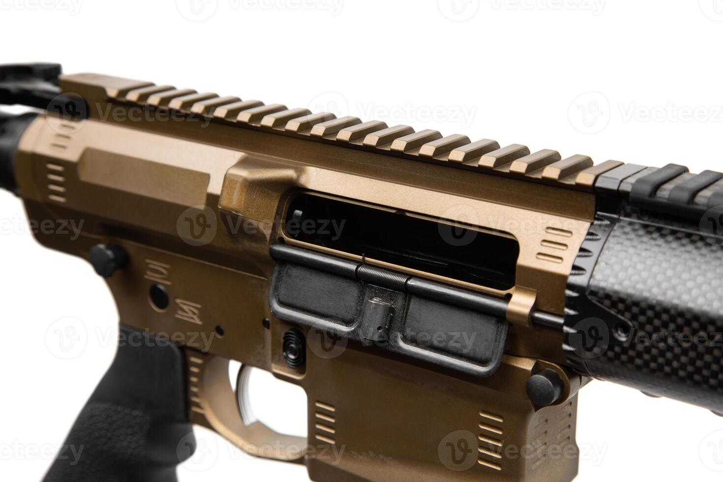 Modern automatic rifle isolated on white background. A gold-coloured weapon with a carbon forearm and barrel. Assault rifle on white back. Automatic carbine. photo