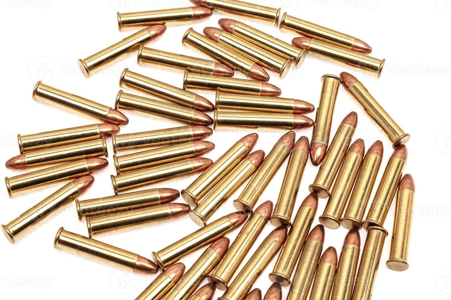 Small-caliber rifle cartridges isolated on white photo