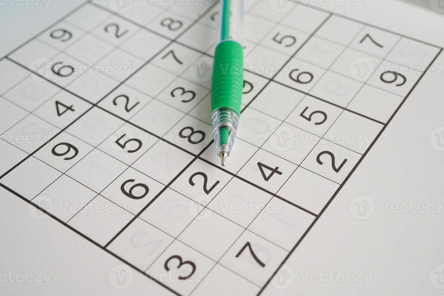 Sudoku puzzle, game to play for keep you brain younger for developing Alzheimer disease in senior patient. photo
