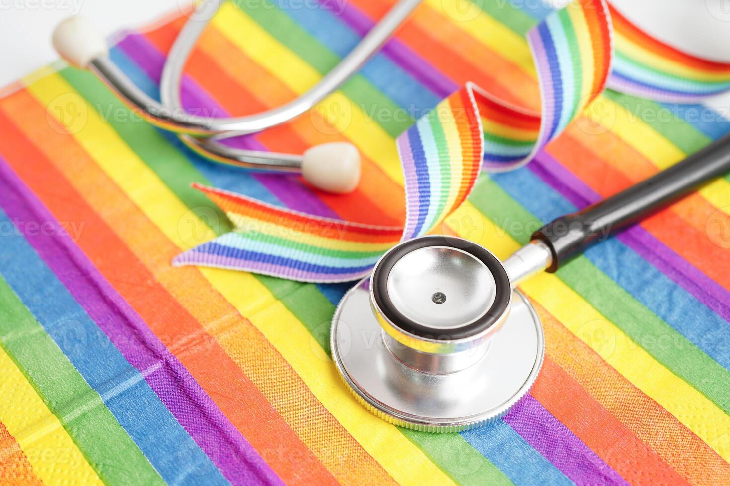 LGBT symbol, Stethoscope on rainbow flag, rights and gender equality, LGBT Pride Month in June. photo