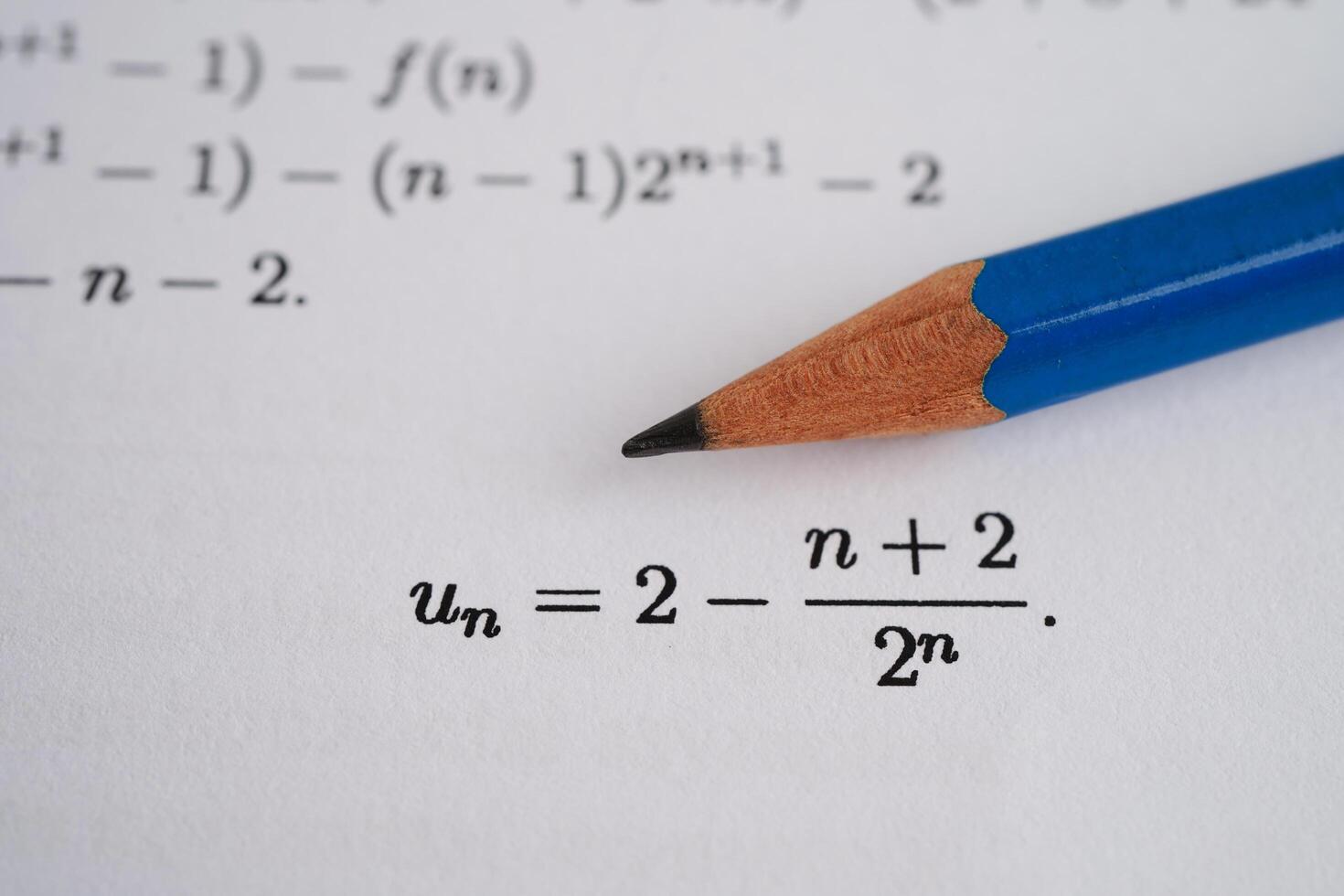 Pencil on mathematic formula exercise test paper in education school. photo