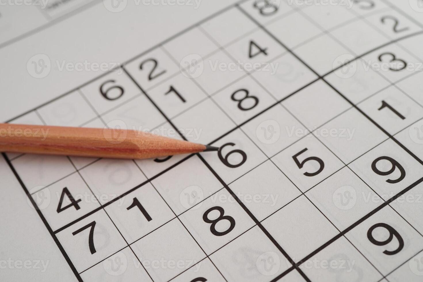 Sudoku puzzle, game to play for keep you brain younger for developing Alzheimer disease in senior patient. photo